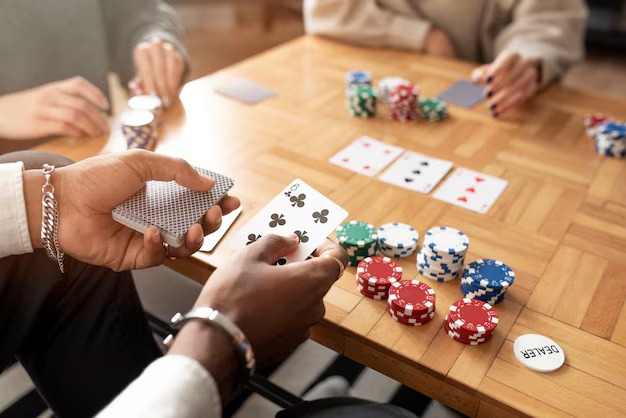 Live blackjack dealer table setup with cards and chips
